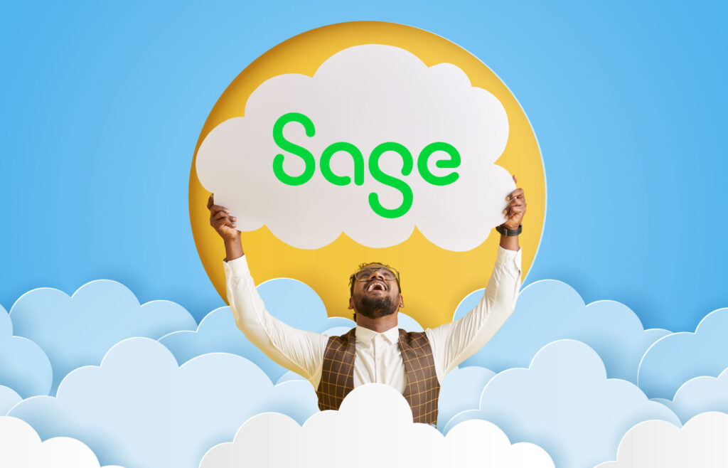 A cheerful man in a white shirt and brown plaid vest holds up a cloud-shaped sign with the green “Sage” logo, standing against a vibrant blue sky background with fluffy white clouds and a bright yellow sun. The image represents Sage’s cloud-based solutions, emphasizing optimism and growth in digital transformation. This visual is perfect for promoting Sage’s cloud services, highlighting themes of innovation, business solutions, and modern technology.